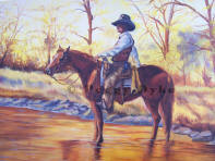 Cowboy on his horse in stream by Peggy Dyke